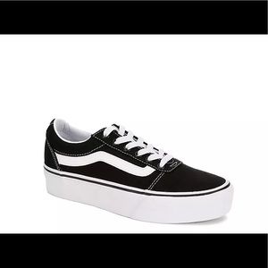 Black and white platform Vans